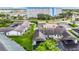 Aerial view of the condo community showcasing the well-manicured lawns, nearby buildings, and parking at 4844 Booth Bay Dr, New Port Richey, FL 34652
