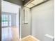 View of light and airy hallway with hardwood floors at 4844 Booth Bay Dr, New Port Richey, FL 34652