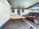 Assigned parking in front of condo with a small garden at 4844 Booth Bay Dr, New Port Richey, FL 34652