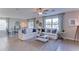 Living Room with white couch and coffee table at 3447 Hilltop Cir, Lakewood Ranch, FL 34211
