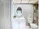 Clean bathroom with white vanity and updated fixtures at 4844 Booth Bay Dr, New Port Richey, FL 34652