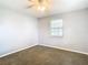 Spacious bedroom with neutral walls and carpeting at 4844 Booth Bay Dr, New Port Richey, FL 34652