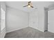 Bright bedroom with double doors and window at 9120 Warm Springs Cir, Parrish, FL 34219