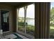 Enjoy water views from this screened lanai at 1440 Emerald Dunes Dr # 9, Sun City Center, FL 33573