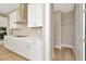 Walk-in pantry with wire shelving; great for storage at 10661 Torchwood Sea Way, San Antonio, FL 33576