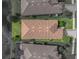 Overhead view of a home with terra cotta roof, nice landscaping and lawn at 5243 Esplanade Blvd, Bradenton, FL 34211