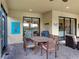 Outdoor dining on the patio with seamless access to the kitchen and living areas at 5243 Esplanade Blvd, Bradenton, FL 34211