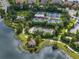 Overhead shot of community tennis courts, playground, and green spaces, promoting an active and engaging lifestyle at 5243 Esplanade Blvd, Bradenton, FL 34211