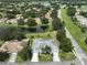 Aerial view of house and community, showcasing the location and surroundings at 902 Mcdaniel St # 1, Sun City Center, FL 33573