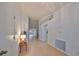 Open entryway with views into the living and kitchen areas at 902 Mcdaniel St # 1, Sun City Center, FL 33573