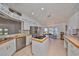 Spacious kitchen featuring an island and stainless steel appliances at 902 Mcdaniel St # 1, Sun City Center, FL 33573