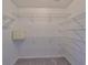 Walk-in closet with wire shelving, offering ample storage space at 902 Mcdaniel St # 1, Sun City Center, FL 33573