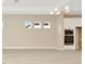 Bright dining area with wood-look tile floors and recessed lighting at 10520 Purple Thistle Way, San Antonio, FL 33576