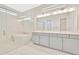 Bathroom features a double vanity, a large soaking tub and glass shower at 10520 Purple Thistle Way, San Antonio, FL 33576