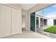 Bedroom with sliding glass doors opening to a private backyard at 10520 Purple Thistle Way, San Antonio, FL 33576