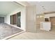 Open entryway with views to the kitchen and patio at 10520 Purple Thistle Way, San Antonio, FL 33576