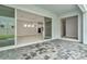 Spacious covered patio with access to the living area at 10520 Purple Thistle Way, San Antonio, FL 33576