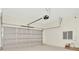 Attached garage with an automatic garage door at 10520 Purple Thistle Way, San Antonio, FL 33576