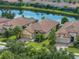 Aerial view of home near lake in a community at 5243 Esplanade Blvd, Bradenton, FL 34211