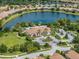 Community center with pool and parking in a lush landscape setting at 5243 Esplanade Blvd, Bradenton, FL 34211