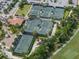 Community tennis courts with surrounding landscaping at 5243 Esplanade Blvd, Bradenton, FL 34211