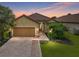 Attractive single-story home with tile roof and landscaped yard at 5243 Esplanade Blvd, Bradenton, FL 34211