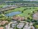 Large clubhouse with tile roof near golf course at 5243 Esplanade Blvd, Bradenton, FL 34211