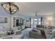 Cozy living room with waterfront views and comfortable seating at 4790 Snook Se Dr, St Petersburg, FL 33705