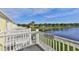 Shared balcony with scenic lake view and community landscape at 4790 Snook Se Dr, St Petersburg, FL 33705