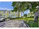 Yellow building exterior with landscaping and parking at 4790 Snook Se Dr, St Petersburg, FL 33705
