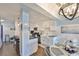 Open kitchen with granite countertops and stainless steel appliances at 4790 Snook Se Dr, St Petersburg, FL 33705