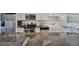Sleek kitchen with granite countertops and farmhouse sink at 4790 Snook Se Dr, St Petersburg, FL 33705