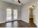 Bedroom with hardwood floors and French doors leading to a deck at 1104 21St N Ave, St Petersburg, FL 33704