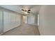 Well-lit bedroom featuring neutral walls and a ceiling fan at 1154 Barbour Ave, Port Charlotte, FL 33948