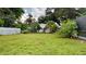 Spacious backyard with lush grass, offering ample outdoor space at 1154 Barbour Ave, Port Charlotte, FL 33948