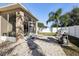 Spacious backyard with screened porch and grill at 7720 Rathdown Ln, Wesley Chapel, FL 33545