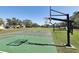 Outdoor basketball court with two hoops at 7720 Rathdown Ln, Wesley Chapel, FL 33545