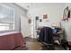 Small bedroom with a single bed and home office setup at 7720 Rathdown Ln, Wesley Chapel, FL 33545