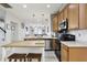 Modern kitchen with stainless steel appliances and island at 7720 Rathdown Ln, Wesley Chapel, FL 33545