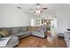 Spacious living room with a comfortable sectional sofa at 7720 Rathdown Ln, Wesley Chapel, FL 33545