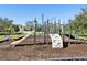 playground with climbing structures and slides at 7720 Rathdown Ln, Wesley Chapel, FL 33545