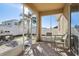 Screened-in porch with patio furniture and access to the backyard at 7720 Rathdown Ln, Wesley Chapel, FL 33545