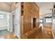 Spacious hallway with built-in storage and wood flooring at 6843 Runner Oak Dr, Wesley Chapel, FL 33545