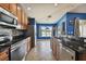 Modern kitchen with stainless steel appliances and granite counters at 6843 Runner Oak Dr, Wesley Chapel, FL 33545