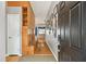 Inviting entryway with built-in shelving and bench seating at 6843 Runner Oak Dr, Wesley Chapel, FL 33545