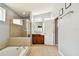 Bathroom with double vanity, soaking tub, and shower at 6843 Runner Oak Dr, Wesley Chapel, FL 33545