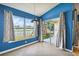Kitchen nook with backyard view and sliding glass doors at 6843 Runner Oak Dr, Wesley Chapel, FL 33545