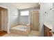 Bathroom with shower, bathtub, and vanity at 6843 Runner Oak Dr, Wesley Chapel, FL 33545
