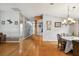 Living room with hardwood floors and built-in shelving at 6843 Runner Oak Dr, Wesley Chapel, FL 33545