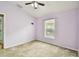 Spacious bedroom with neutral walls and ceiling fan at 6843 Runner Oak Dr, Wesley Chapel, FL 33545